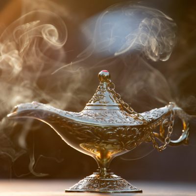 Magic lamp from the story of Aladdin in smoke concept for wishing, luck and magic